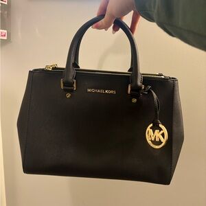 Michael Kors Black Satchel with Gold Accents